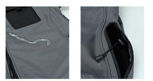 graue wasserfeste Weste mit schwarzem Reißverschluss und Taschenfutter als Teil eines für Outdoor- und taktische Einsätze ausgelegten Sets aus Herren-Taktikfleecejacke und Cargohosen.