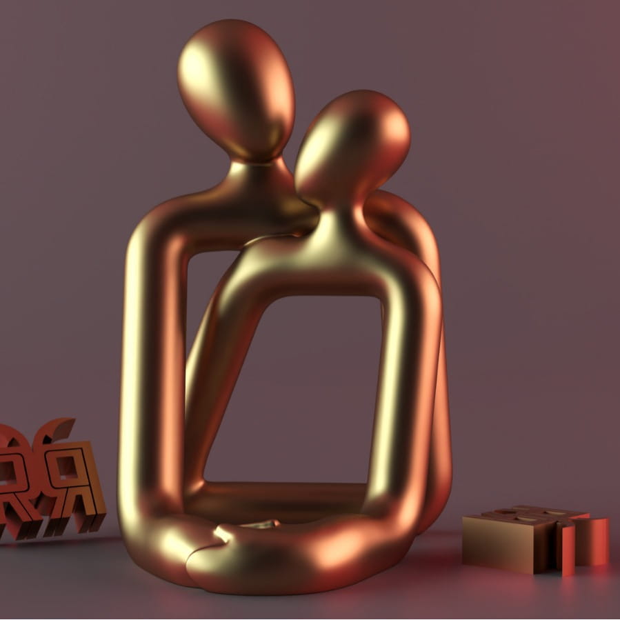 Goldfarbener abstrakter Keramik-Kerzenhalter mit zwei ineinander verschlungenen Harzfiguren mit glatten, rund geformten Konturen in einem Design als Paarskulptur.