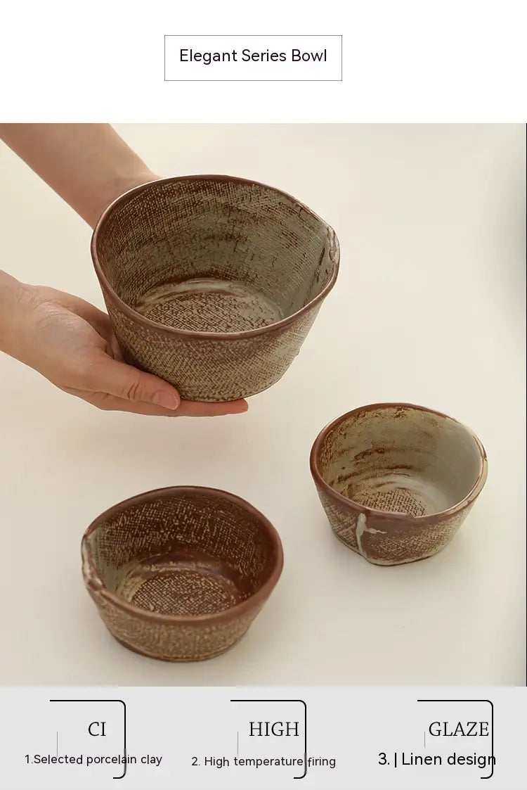 Handcrafted ceramic rice bowl in earthy brown tones with a textured linen-like glaze finish suitable for soup.