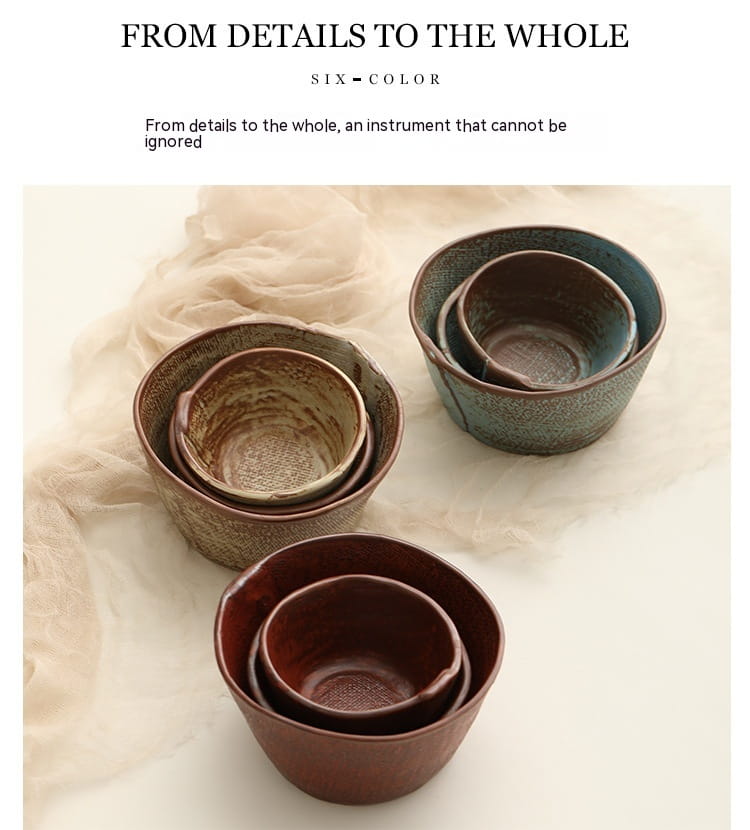 Set of six handcrafted ceramic rice and soup bowls in earthy tones with textured glazed surfaces.