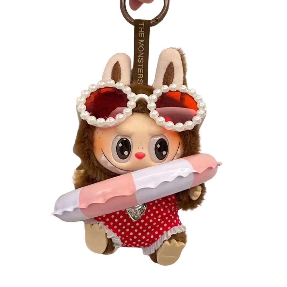 A 17cm labubu doll plush bunny keychain with brown fur wearing pearl-rimmed red sunglasses and a red polka-dot dress