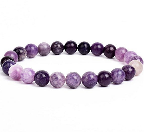 Unisex 8mm polished agate and amethyst stretch bracelet featuring smooth round purple and black beads with a marbled texture.