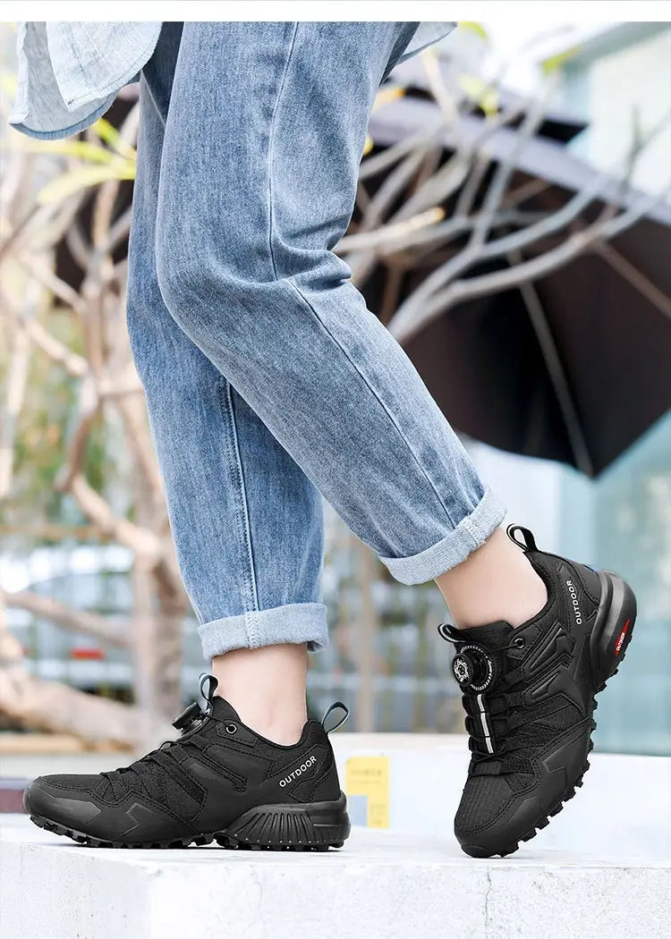 Black x111 lightweight off-road breathable hiking shoe with a textured rubber sole and mesh upper designed for outdoor use.