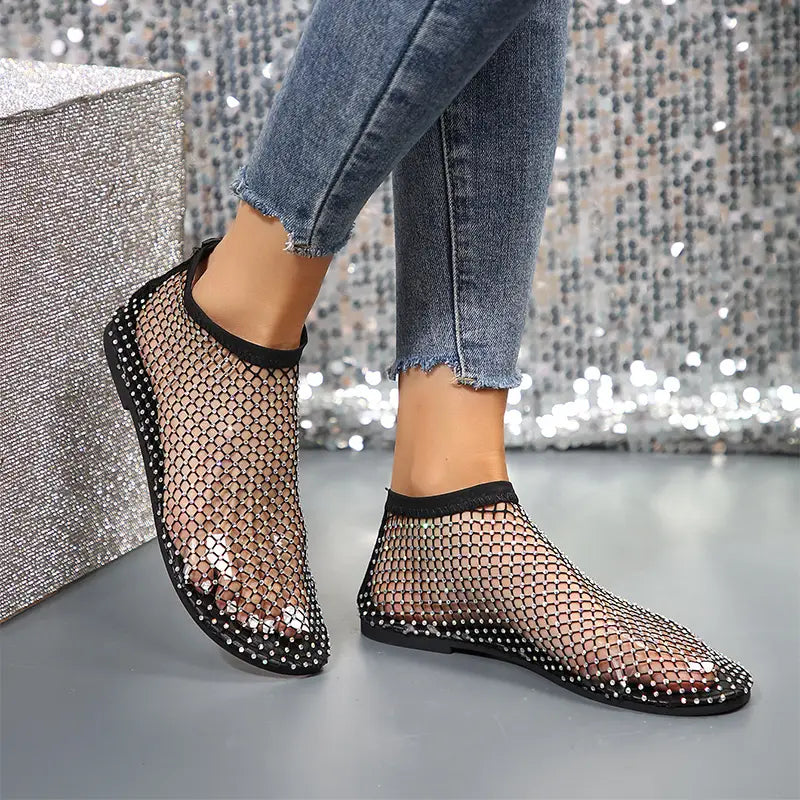 Black mesh ankle boots for women with rhinestone embellishments and flat soles.
