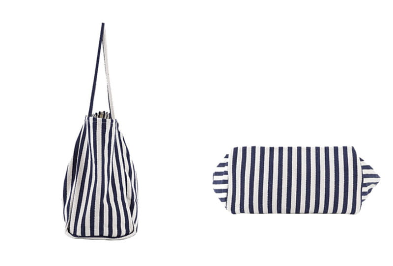 Navy and white striped canvas tote bag with a high capacity and a single shoulder strap for convenient carrying.