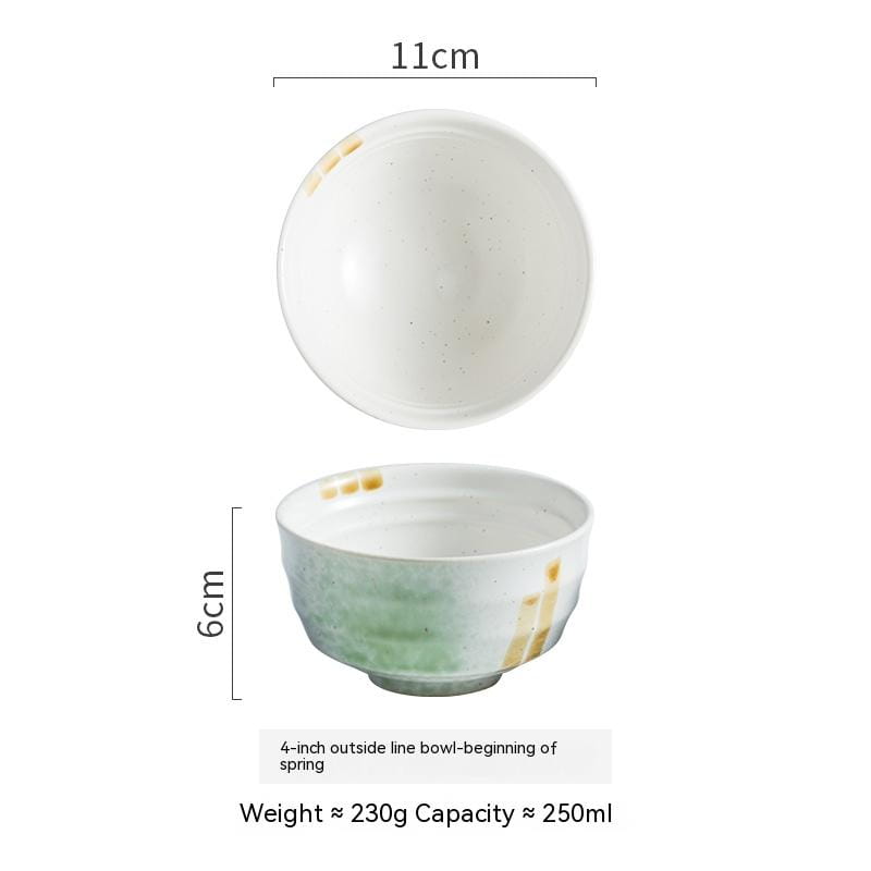 A delicate ceramic bowl with a soft green gradient and subtle gold accents made of retro porcelain, measuring 11cm in diameter and 6cm tall, suitable for rice tableware.