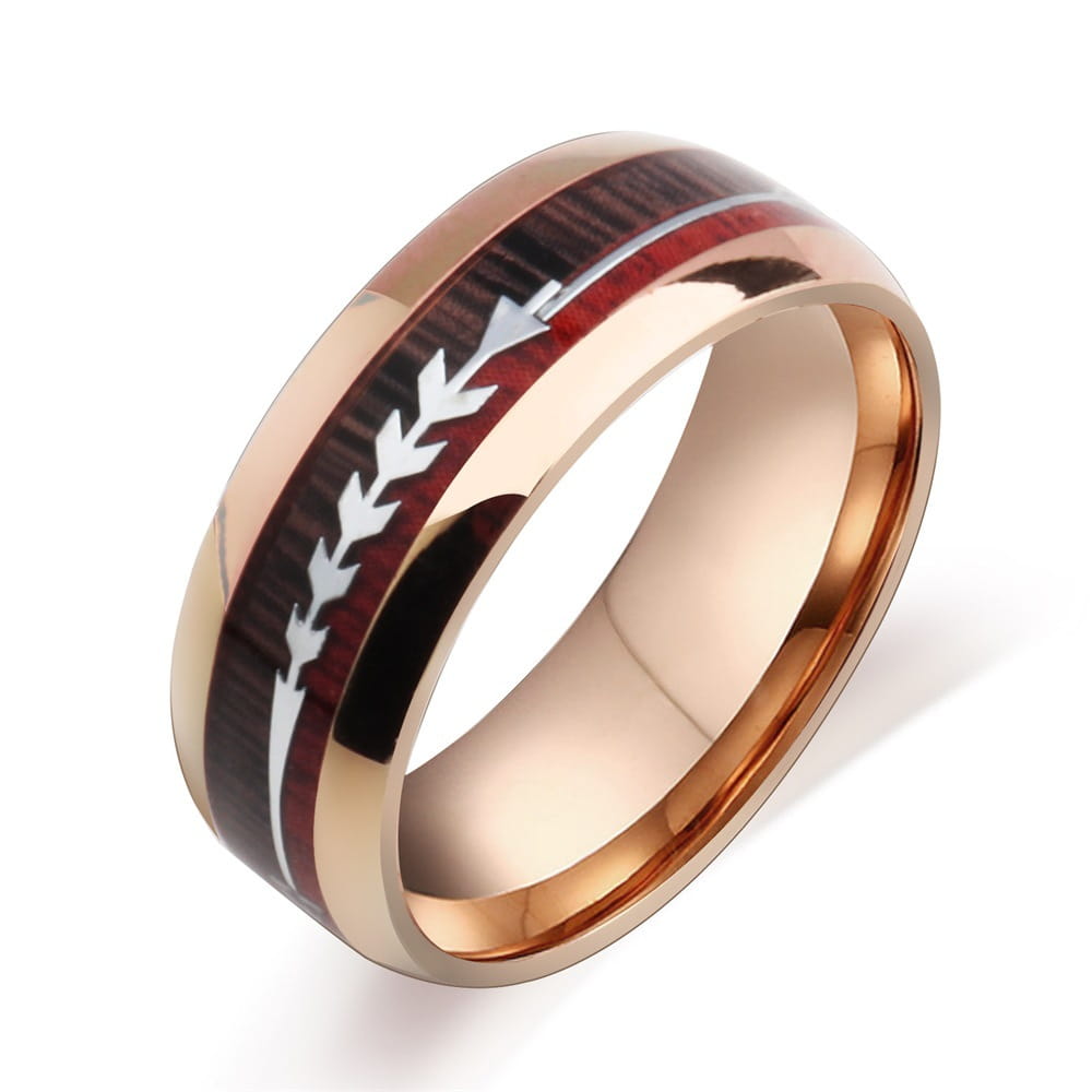 rose gold stainless steel wedding band featuring a dark wood and red resin inlay with an engraved silver arrow design