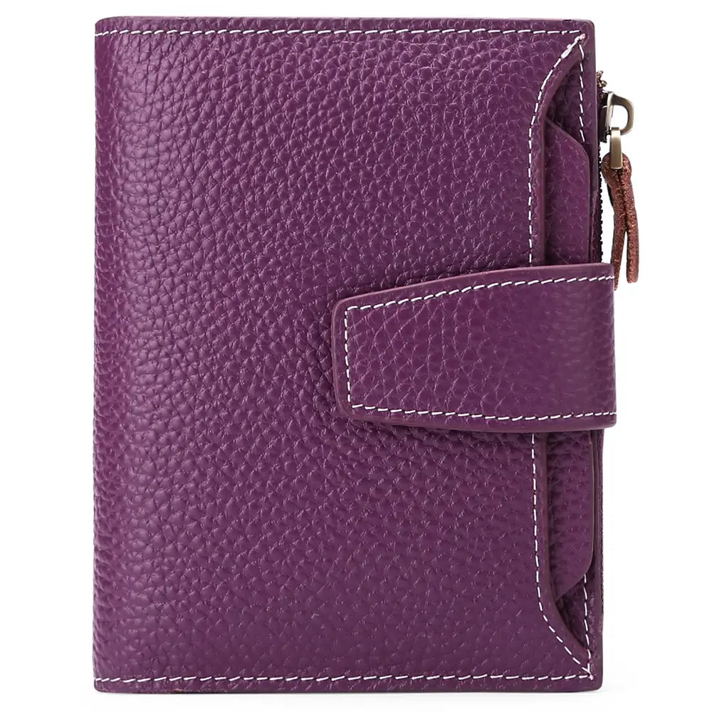 Purple textured leather RFID wallet with white stitching and zipper closure featuring an anti theft feature.