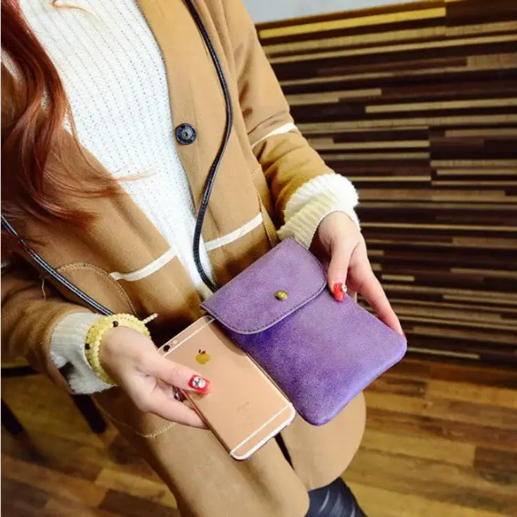 Purple suede mini wallet with single gold-tone button closure featured in the Old Worldly Charm matte suede vegan leather crossbody bag collection.