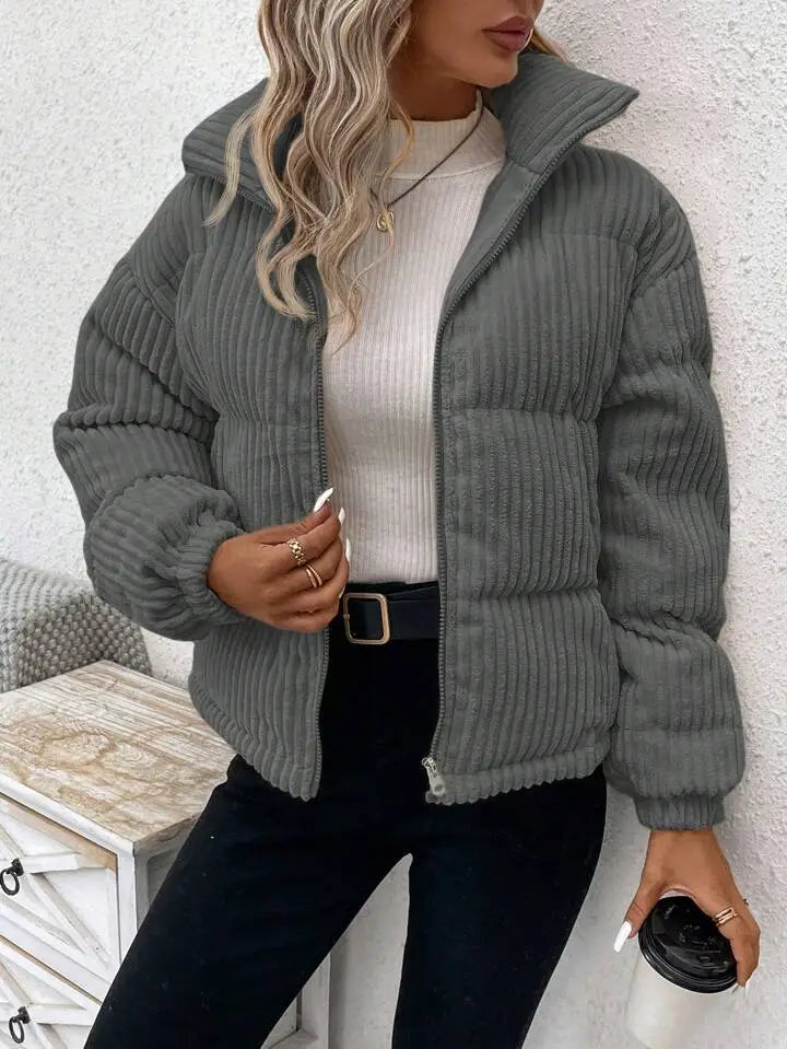 Gray corduroy puffer jacket plus size women winter coat with hood and front zipper displayed from the front.