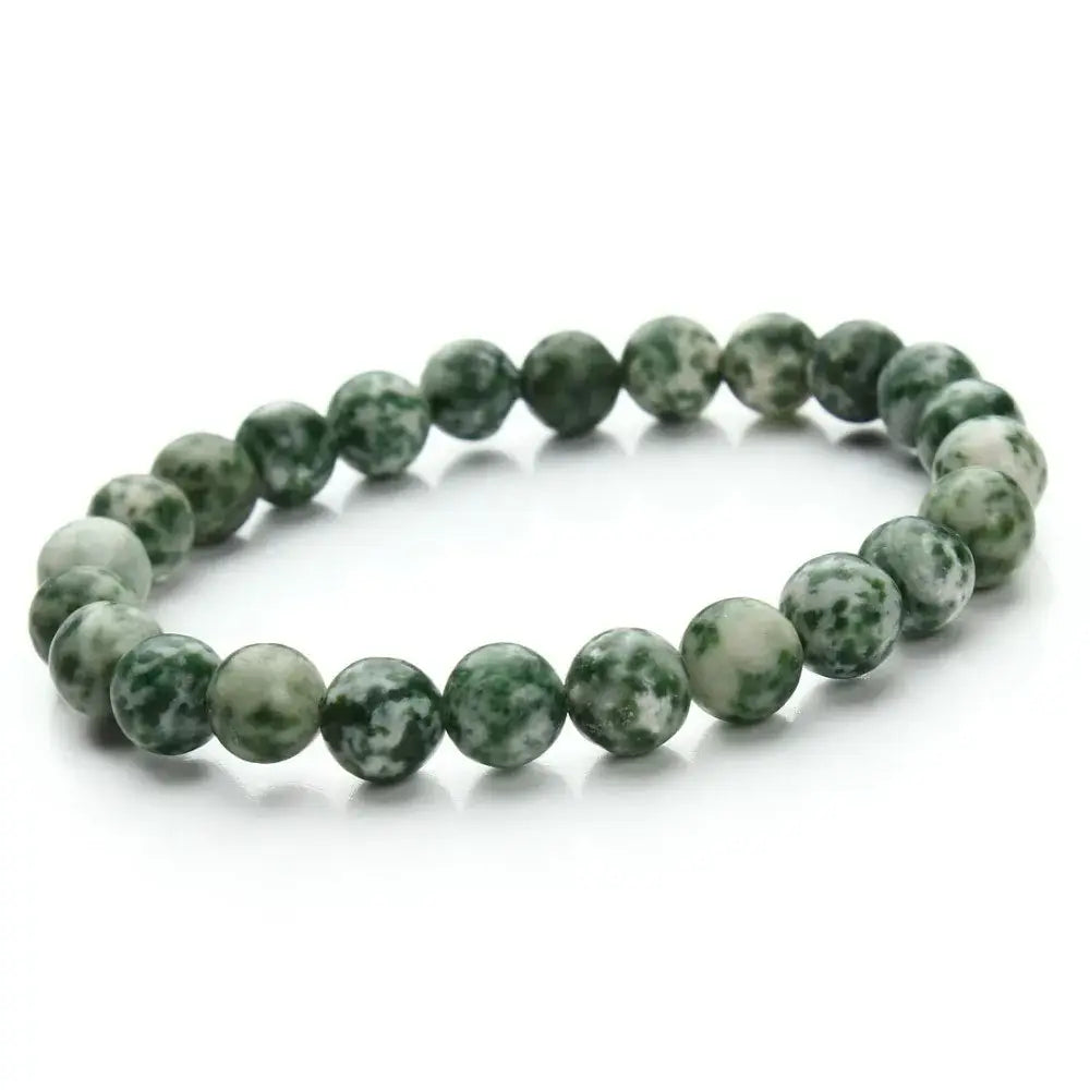 A natural polished gemstone and agate beaded bracelet featuring smooth round green and white marbled stone beads.