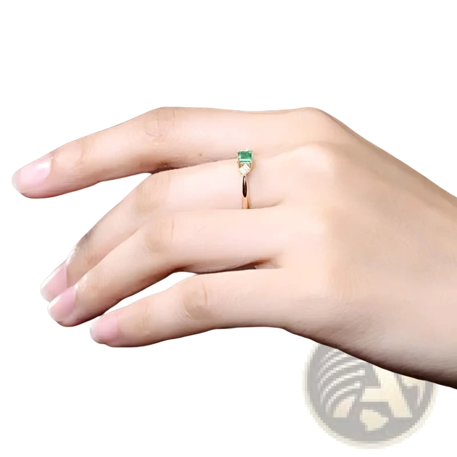 18k gold emerald diamond engagement ring with a delicate rose gold band and rectangular emerald stone in minimalist design