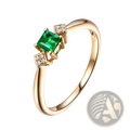 18k gold emerald diamond engagement ring with a central emerald-cut green gemstone and two square diamond settings