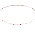18k gold pearl ruby pendant necklace featuring a delicate gold chain with alternating white pearls and red gemstones