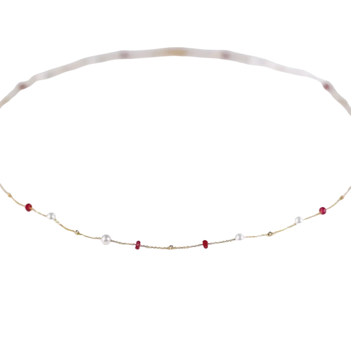 18k gold pearl ruby pendant necklace featuring a delicate gold chain with alternating white pearls and red gemstones