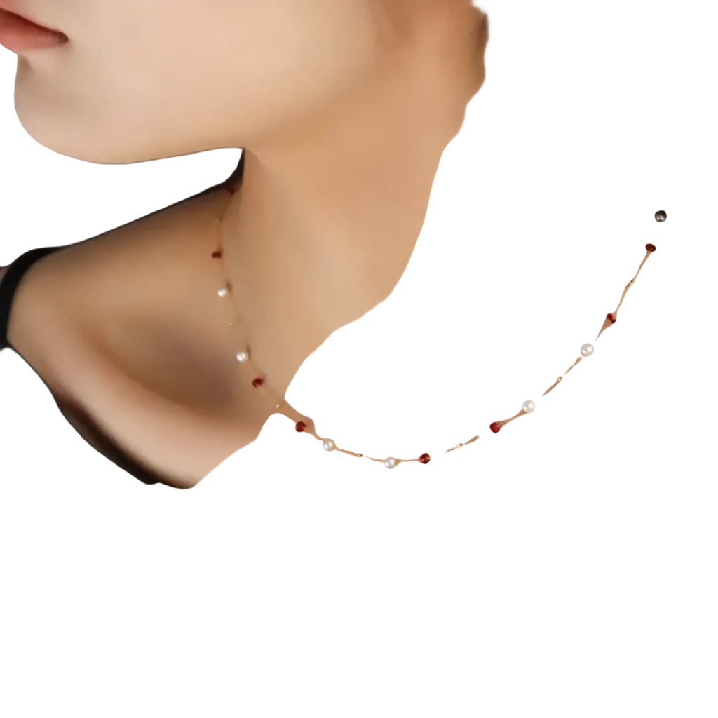 18k gold pearl ruby pendant necklace with a delicate gold chain featuring alternating white pearls and red gemstones
