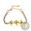 18k gold plated crystal flower double strand bracelet with gold-toned band, three flower charms, and rhinestone details