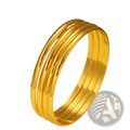 Set of four sleek polished 18k gold plated minimalist stackable bangles with a smooth reflective finish