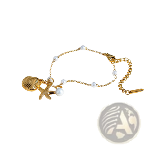 18k gold plated pearl shell and starfish charm bracelet with a delicate gold-toned chain and sea-themed charms