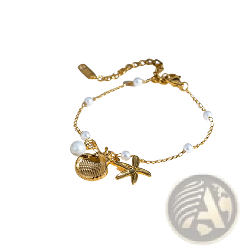 18k gold plated pearl shell and starfish charm bracelet with delicate chain and textured seashell and starfish charms
