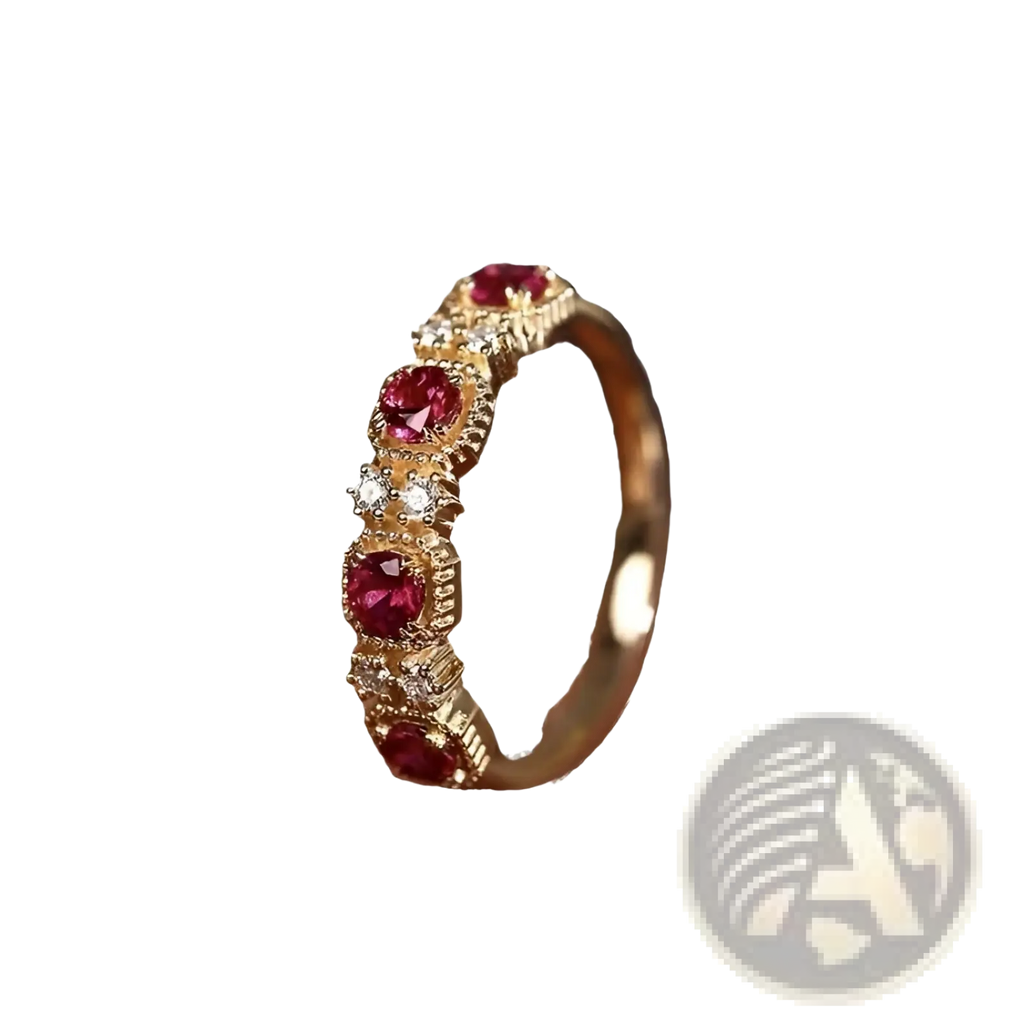 18k gold plated band ring with five pigeon blood ruby gemstones in ornate bezels accented by clear diamonds
