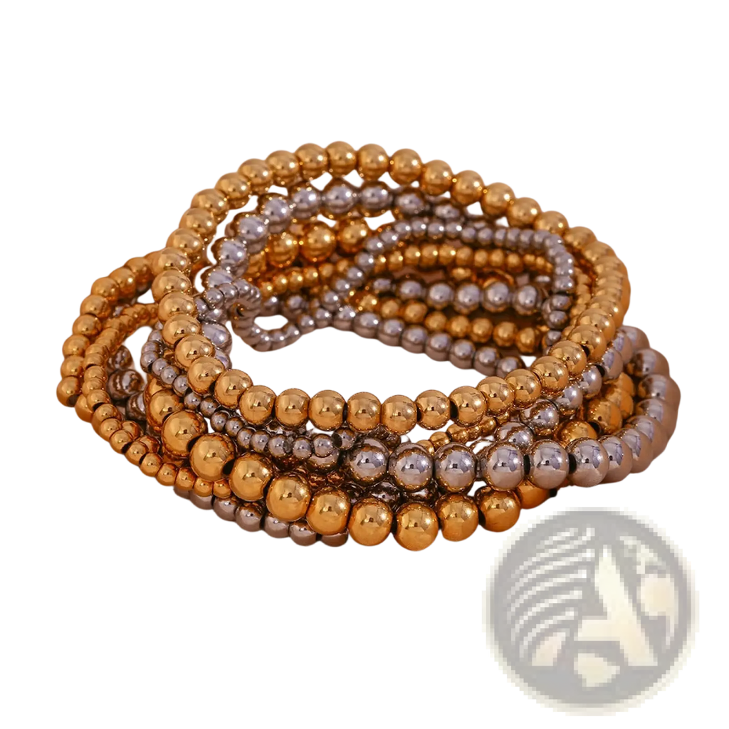 Stacked gold and silver beaded stretch bracelets made of 18k gold plated stainless steel elastic beads