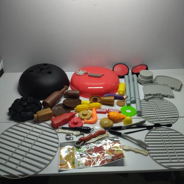 red plastic grill lid with silver handle and white polka dot detail for smoking barbecue grill toy with light and sound ic