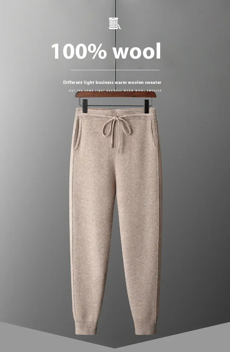 Beige men’s wool harem pants made of 100 percent wool with a high waist, drawstring waist, and side pockets designed as casual joggers.