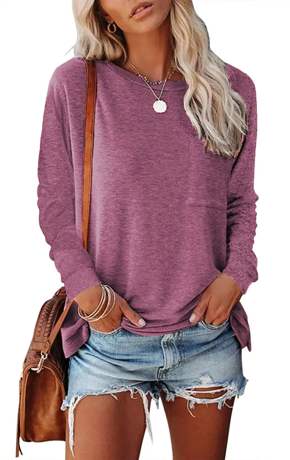 Purple heathered relaxed pocket knit long sleeve t-shirt with a relaxed fit and side slits.