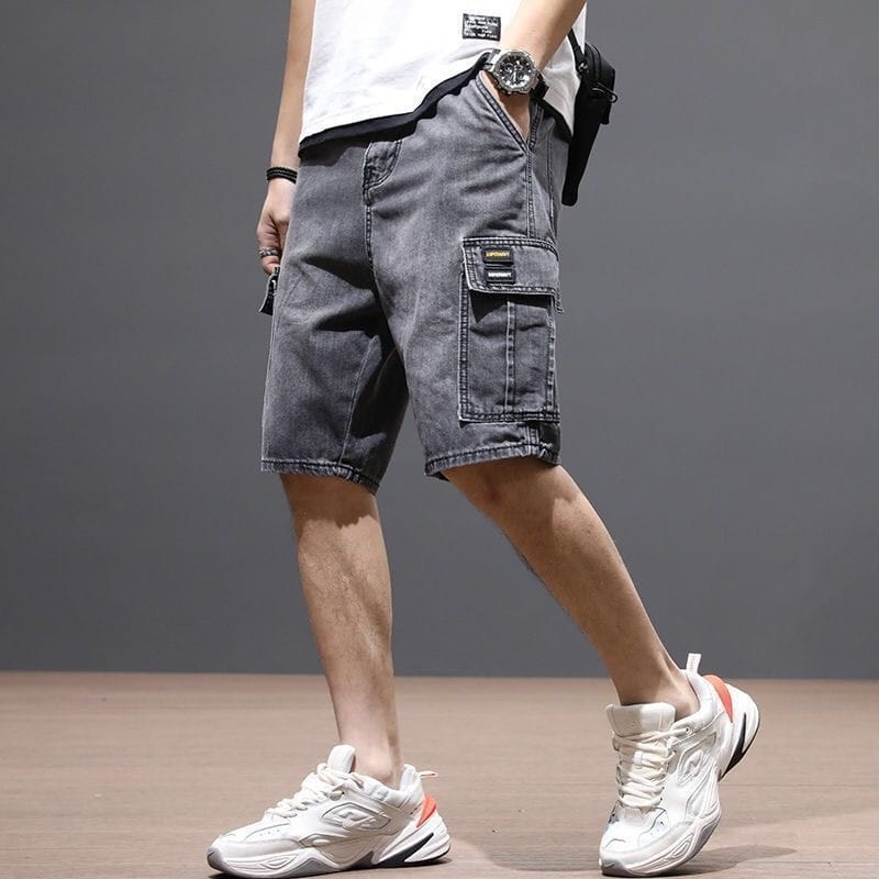 dark gray denim cargo shorts for youth featuring a cargo pocket and subtle stitching details designed for workwear use