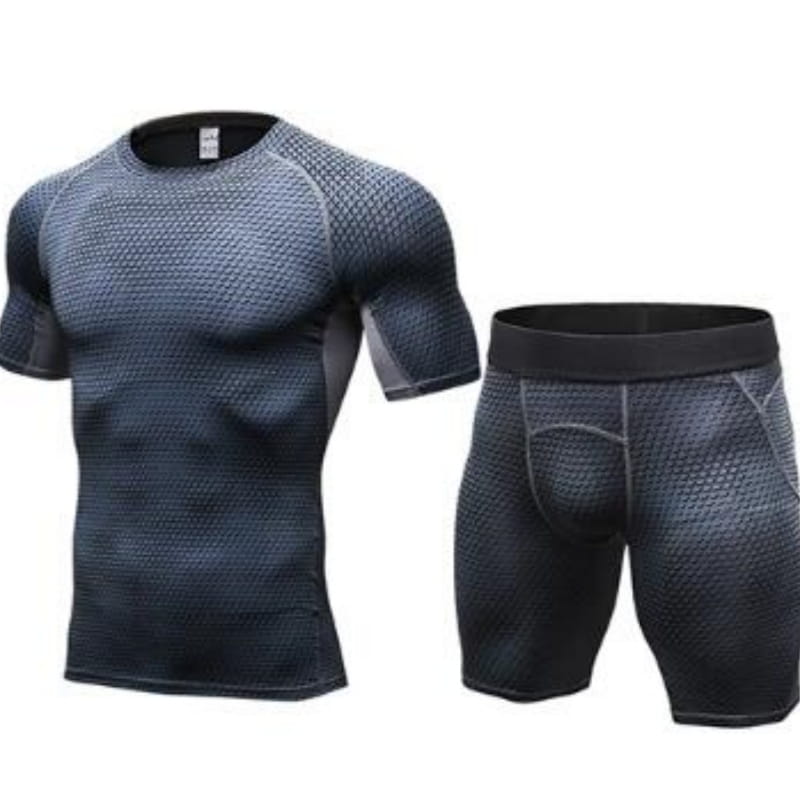 Dark gray compression gym shorts set featuring a textured mesh-like fabric with subtle black accents on the sleeves and waistband.
