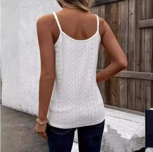 White lace knit camisole vest set featuring a white crochet tank top with a delicate lace-like pattern and thin straps.