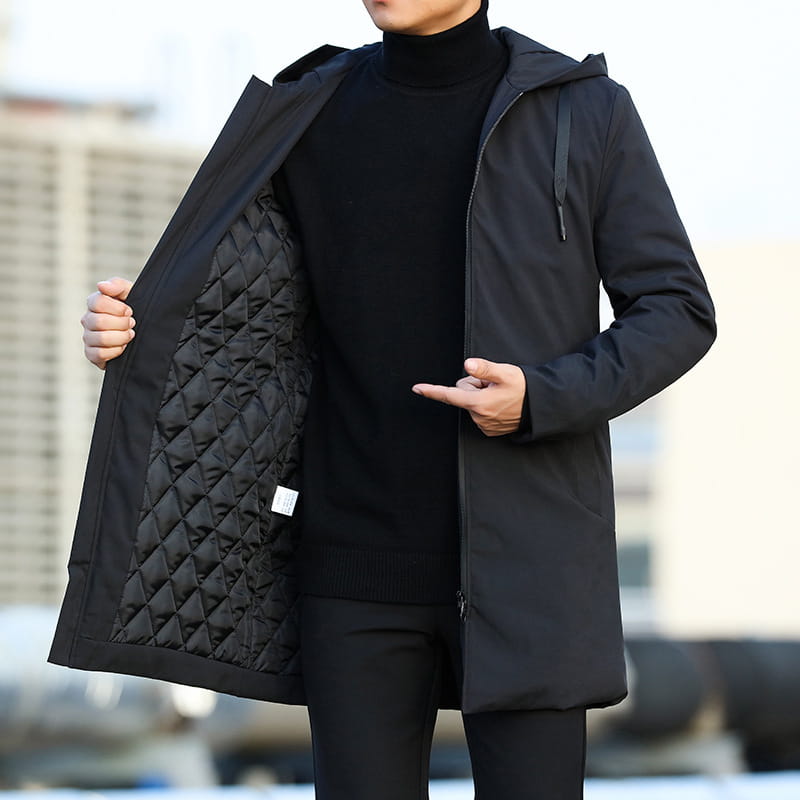 Men thick hooded winter jacket in black quilted fabric with a sleek modern design for cold weather protection.