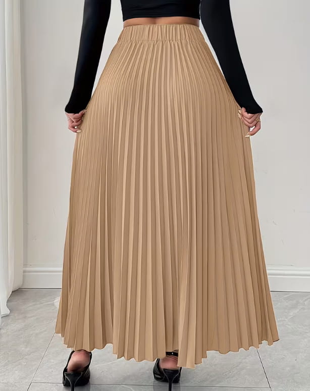 Beige high-waisted pleated midi skirt with belt featuring flowing gathered fabric in an a-line silhouette.