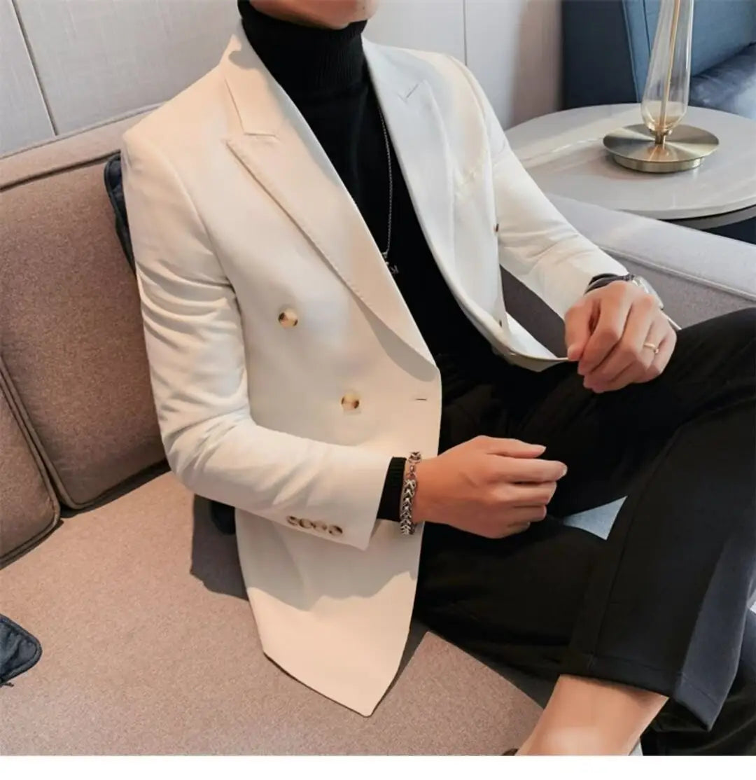 A sleek white double-breasted blazer with gold-toned buttons and a tailored fit in contrast to the teal double-breasted corduroy jacket for men.