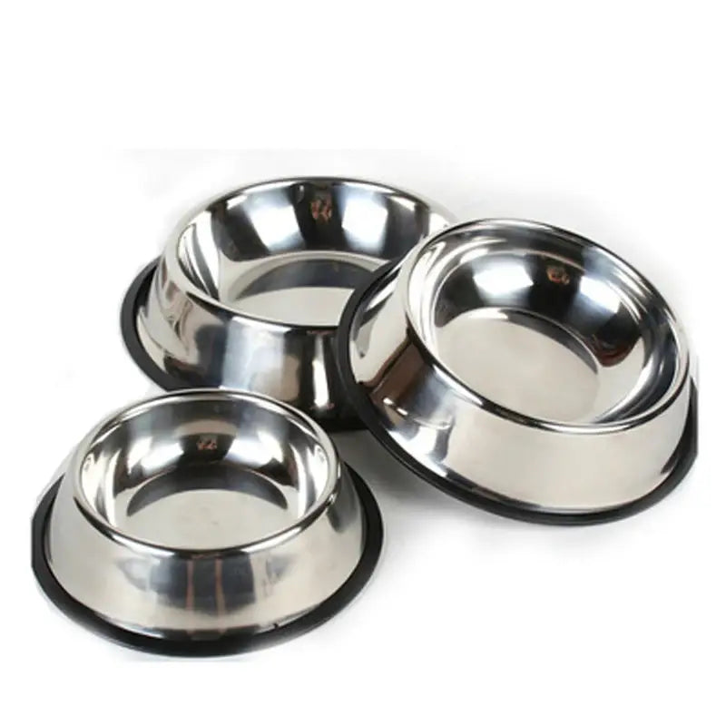 Set of three shiny stainless steel pet bowls with non slip black rubber bases for stable feeding.