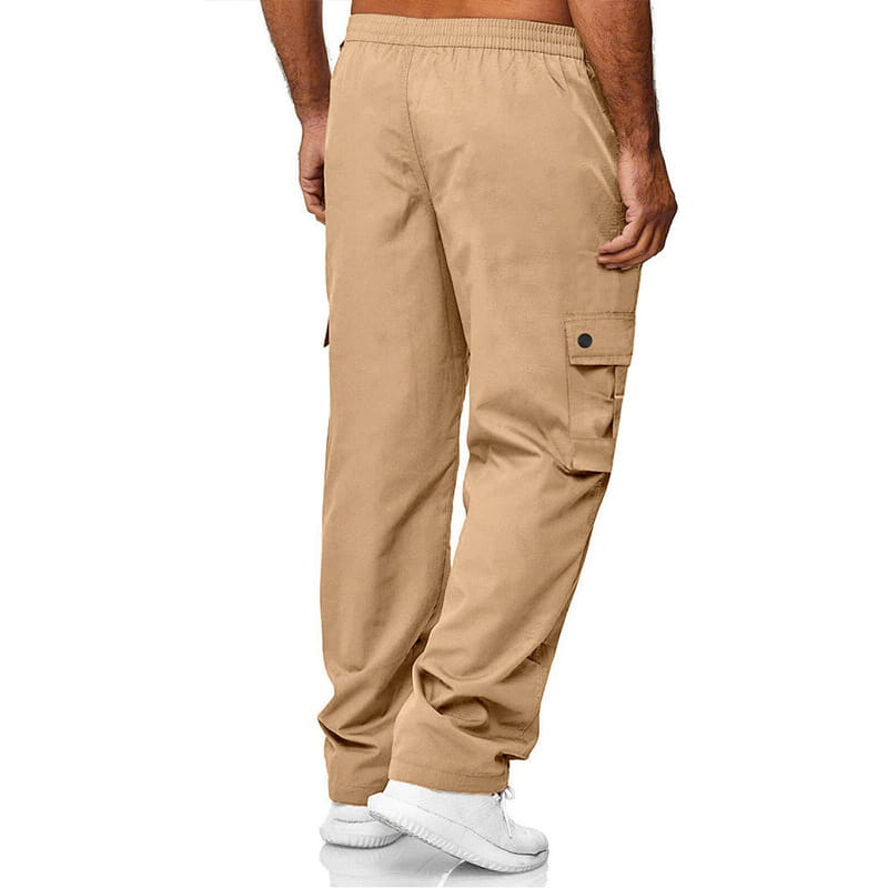 Beige mens straight leg cargo work pants featuring an elastic waistband and multiple pockets designed for durability and functionality.
