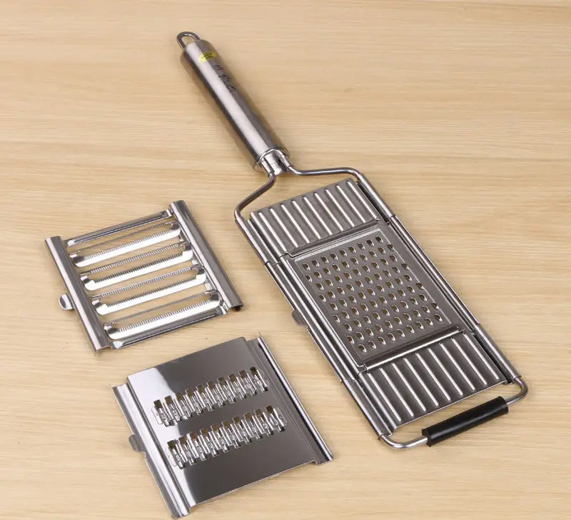 Juego de rallador y cortador multiusos de acero inoxidable con cuchillas intercambiables para triturar, cortar en láminas y trocear verduras.