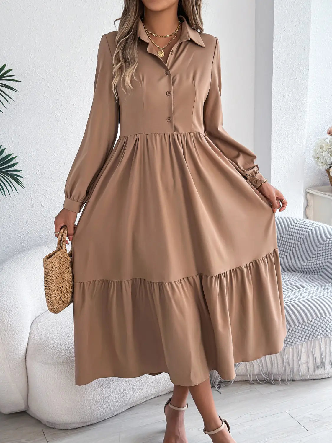 Beige long sleeve tiered button down midi dress with fitted waist and ruffle hem for women.