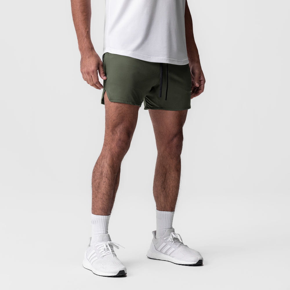 olive green men quick dry athletic sports shorts with drawstring waistband and side pockets designed for sports and exercise.