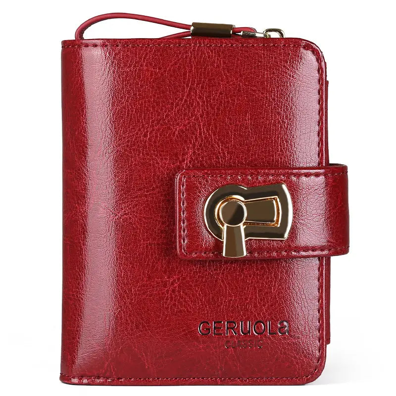 Red leather women’s large capacity buckle wallet with rfid protection and gold-tone keyhole-style clasp embossed with brand name.