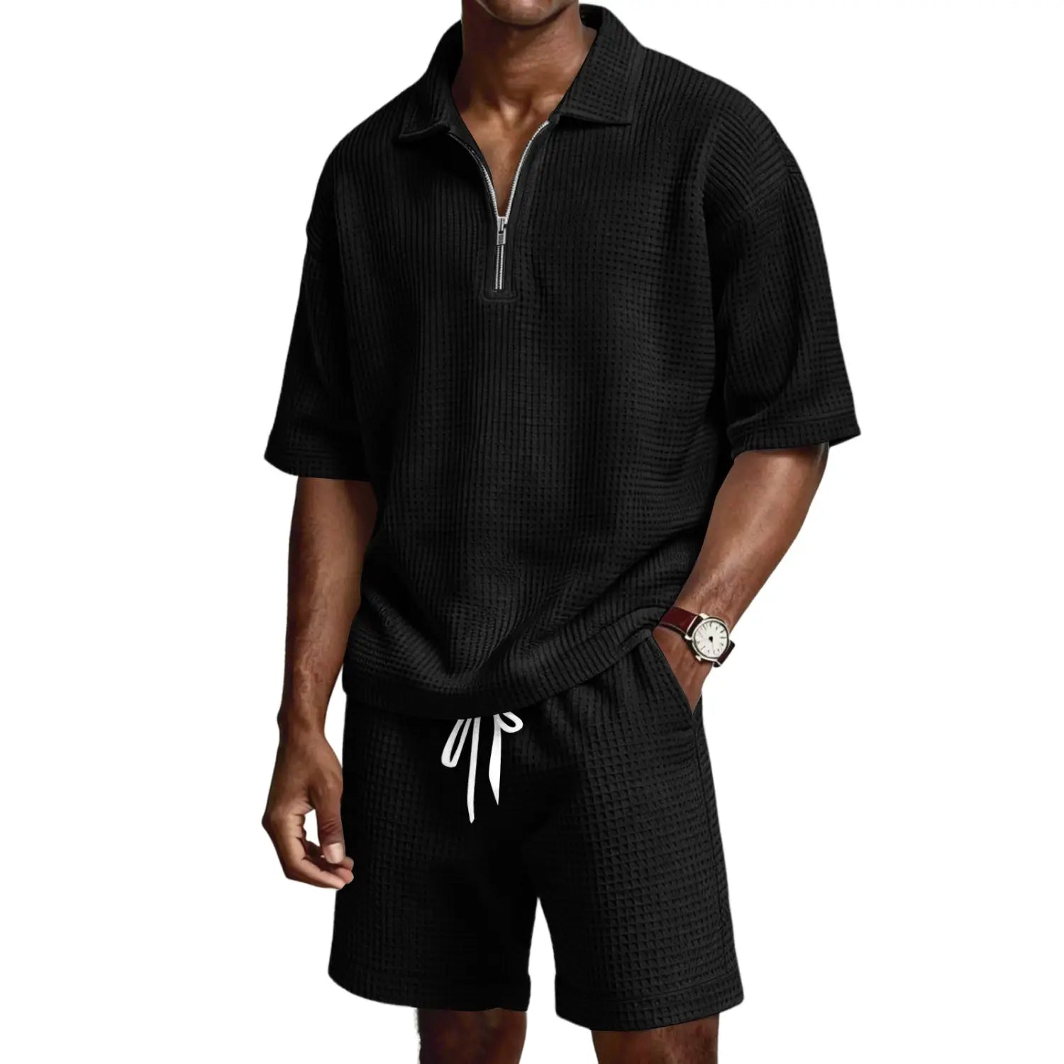 Chemise polo noire texturée à manches courtes, avec col à demi-zip et tissu côtelé en maille nid d’abeilles, issue d’un ensemble short polo à demi-zip en maille nid d’abeilles