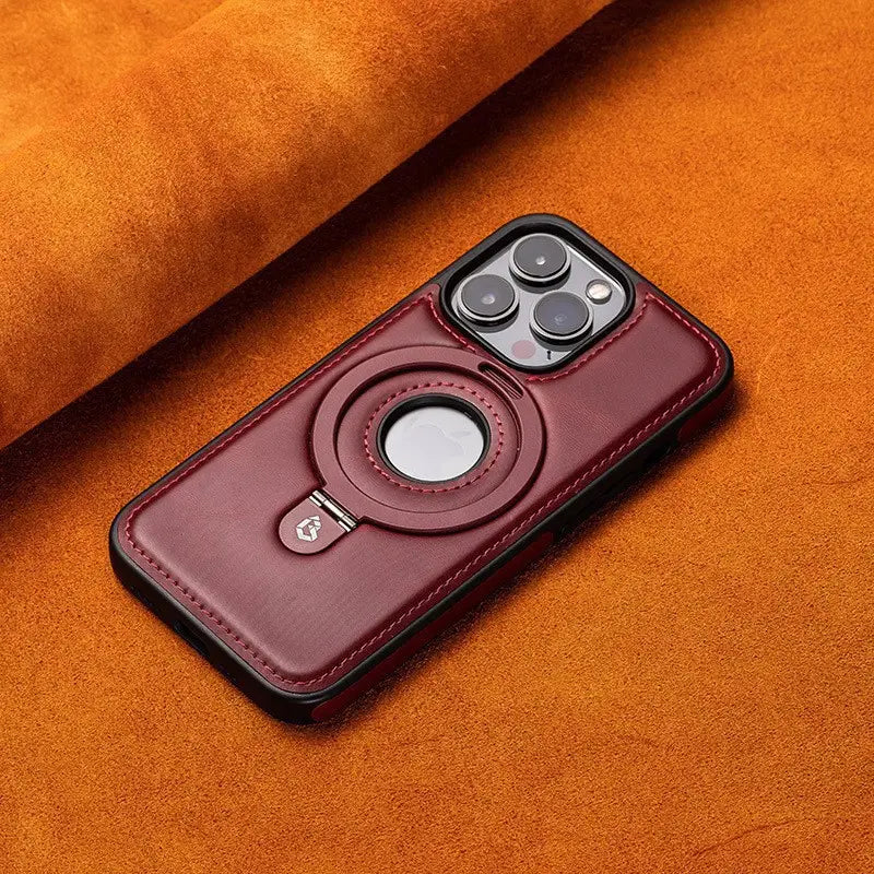 Burgundy leather Iphone 16 Pro Max magnetic case with stand shown from the back side featuring a circular magnetic ring and black stitching.