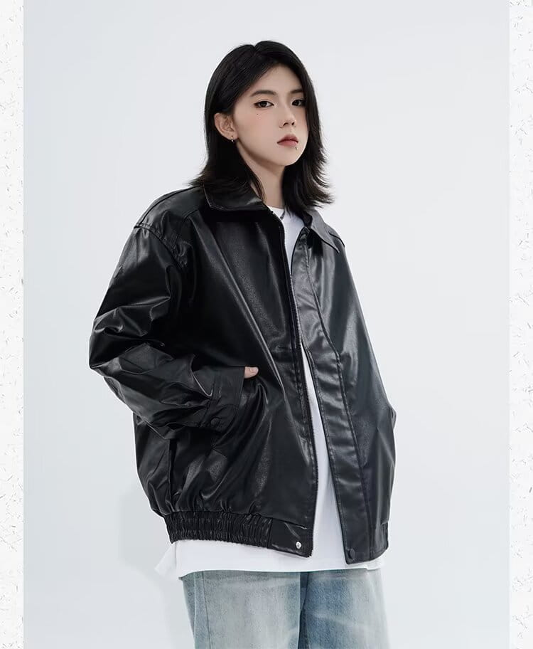 Men’s black faux leather bomber jacket with a glossy finish and elasticated waistband in a relaxed fit outerwear style.
