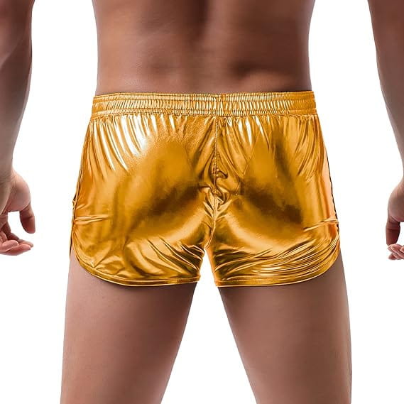 Mens shiny metallic casual shorts in gold with a snug fit and elastic waistband made of shiny gold metallic material.