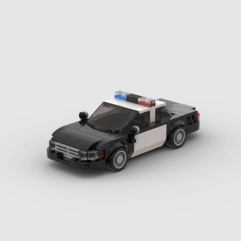 Bloques de construcción del modelo de patrulla de policía de lego en blanco y negro, con luces azules y rojas en el techo, para niños y adultos.