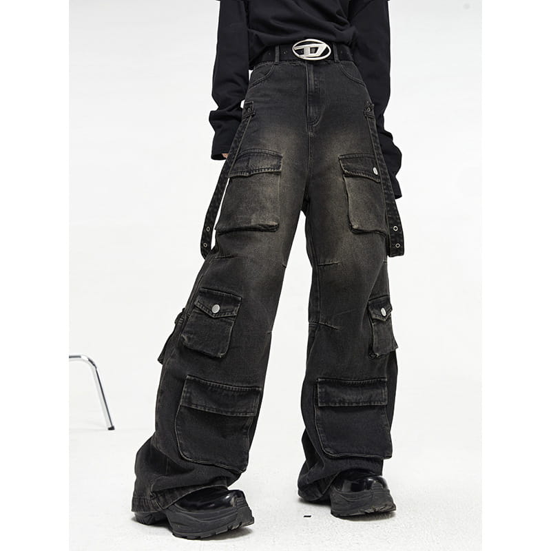 Men’s black distressed wide leg cargo jeans made of denim with multiple pockets for a casual and rugged style.