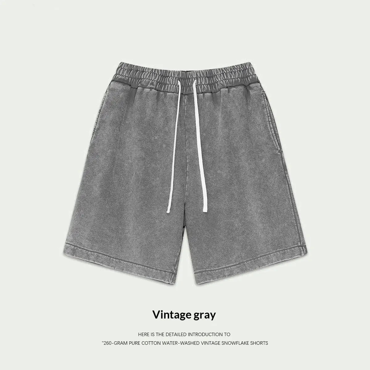 Vintage gray distressed cotton shorts with white drawstrings for summer casual wear in mens vintage snowflake summer apparel.