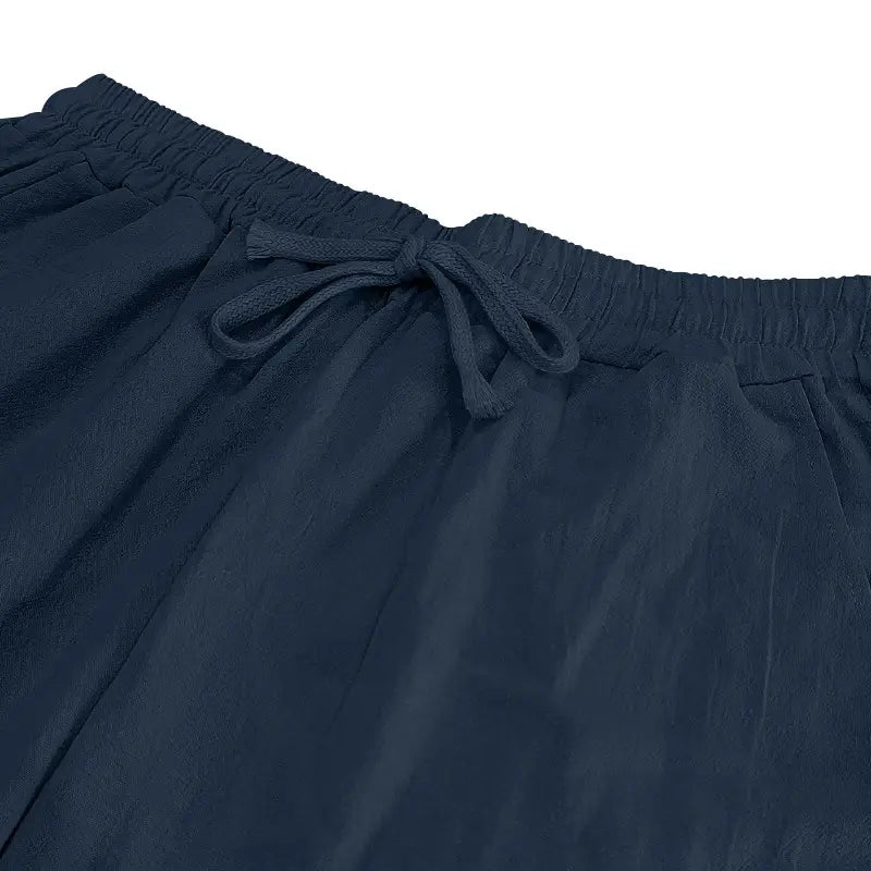 Men’s linen joggers casual drawstring pants in dark navy blue with soft-textured fabric and elastic waistband featuring a matching drawstring.