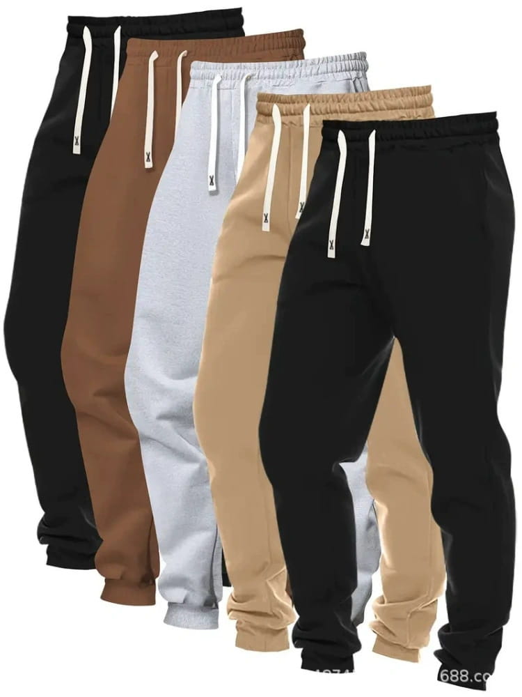Men’s 5-pack solid jogger pants featuring black beige and gray jogger-style sweatpants with white drawstrings and a small x logo on each end.